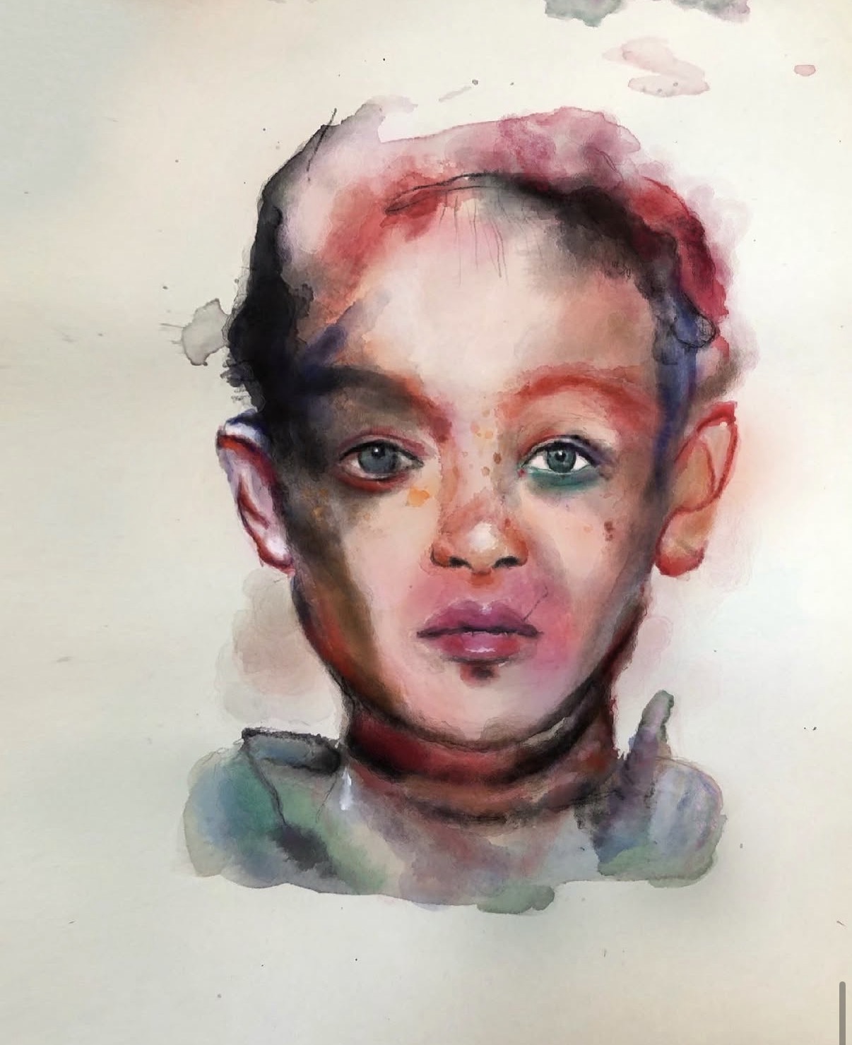 Watercolor portrait of a child's face